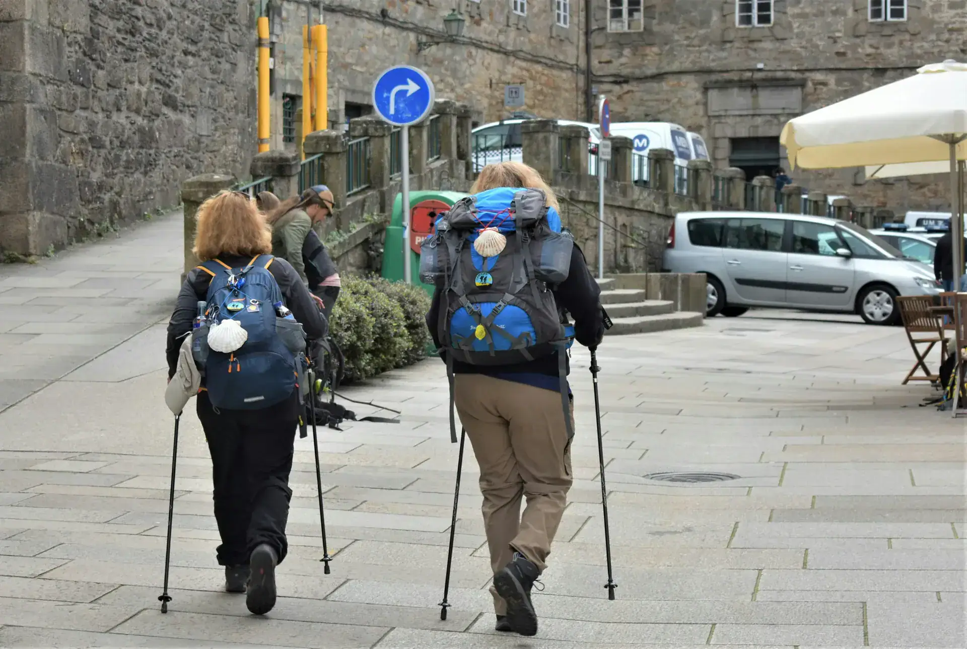 Travellers walking together on a scenic journey, representing global travel destinations and meaningful exploration.